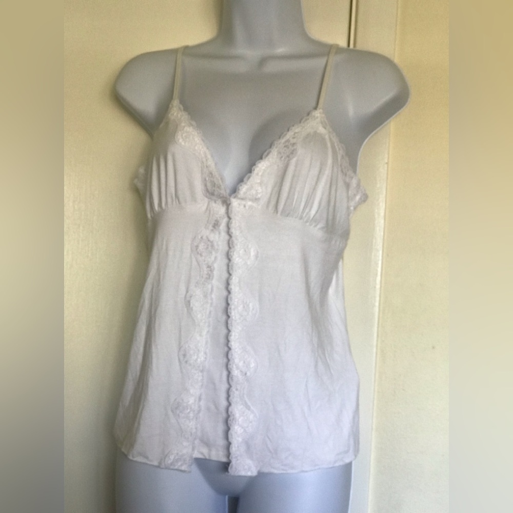 C.P.W. new york , size M , adjustable straps , beautiful front details, white
